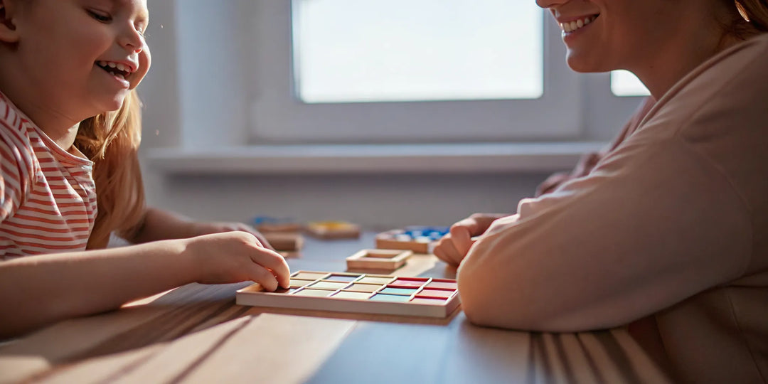 Mother and child playing educational phonics games at home