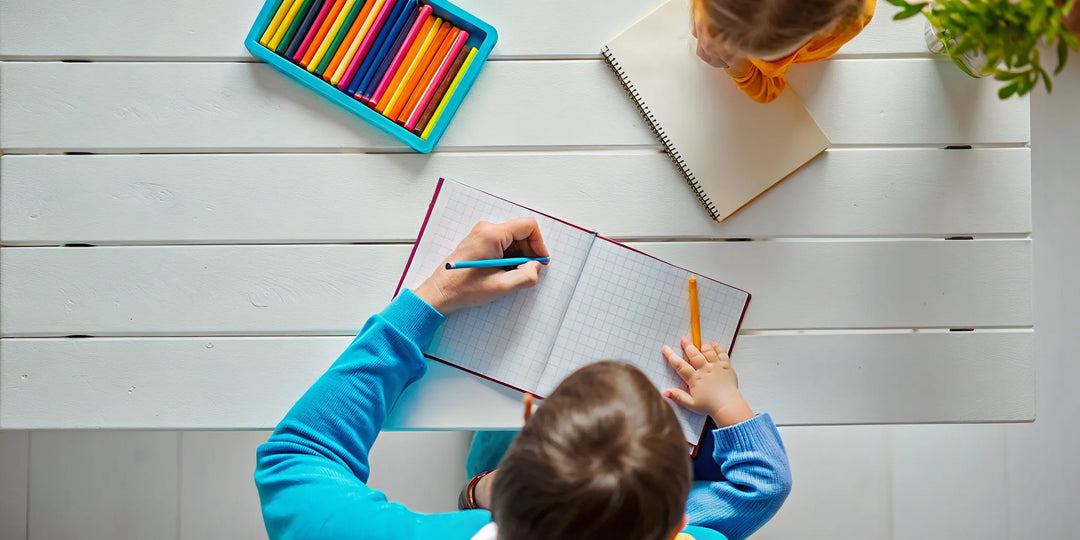 Child practicing print and cursive handwriting